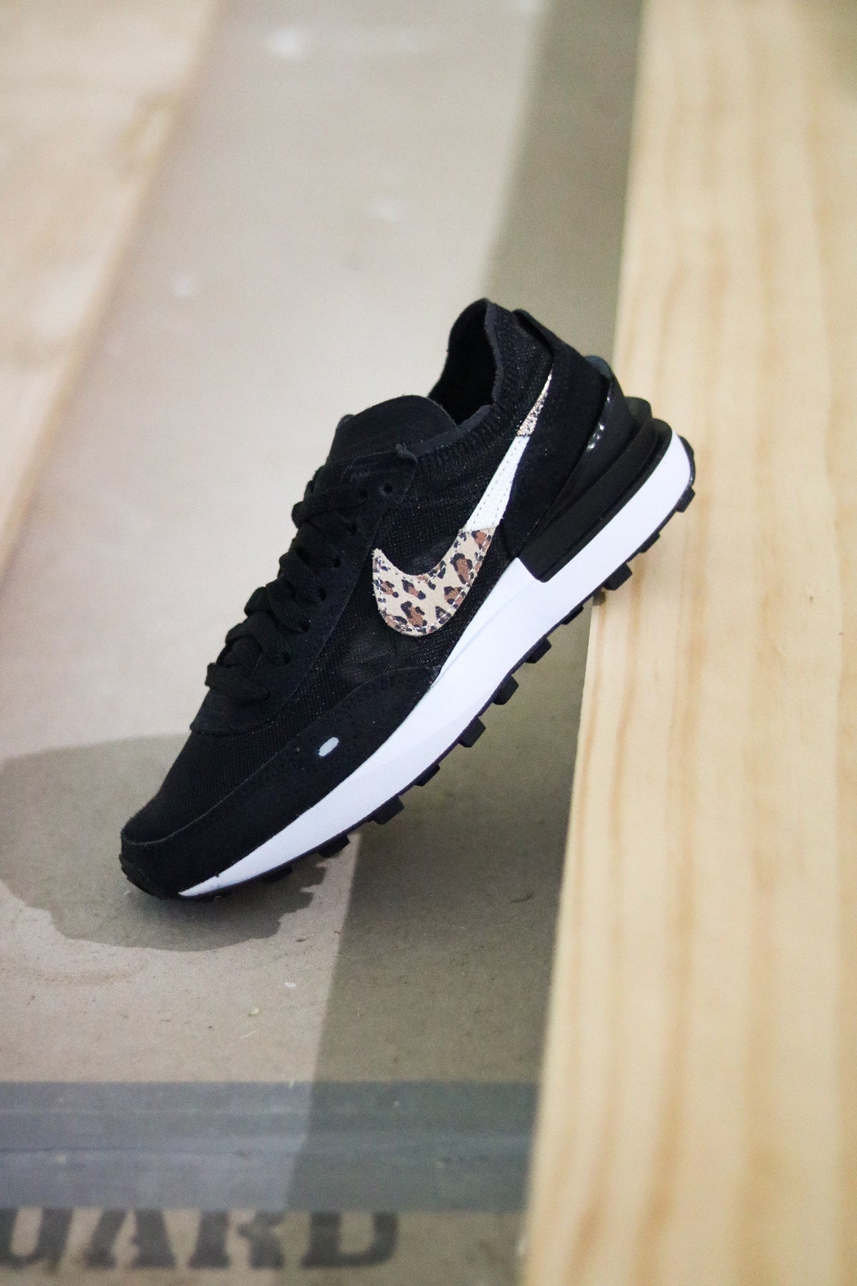 Nike black leopard deals